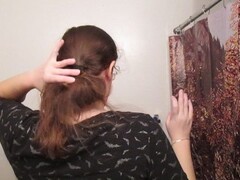 Taking Out a Lazy Bun with Long Curly Hair Thumb