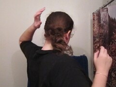 Removing a Side Bun with Long Curly Hair Thumb