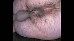 Latino boy showing his brown eye Thumb