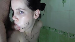 Hot bitch sucks dick and gets cum on her face. Sex service in the bathroom Thumb