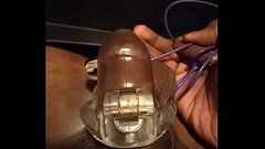 Cock vibes in cage with plug in ass Thumb