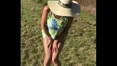 Brunette pees her knickers outdoors Thumb